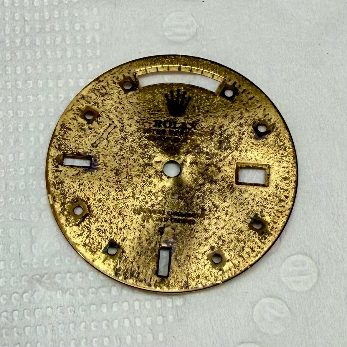 Rolex watch dial repair process: rust removal 1