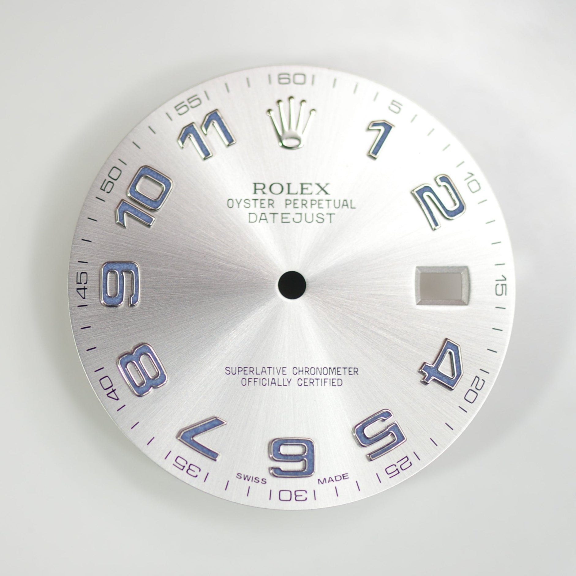 Rolex datejust II watch dial with silver metallic finish and blue hour markers